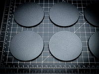 Detailed view of 80mm round bases with texture visible