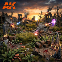 Painted AK Interactive Basing Bits in a complete battlefield diorama scene featuring village ruins, ferns, mushrooms, cacti, barrels, skulls, blood effects, weapon shot effects, portal FX, candles, and smoke on a wargaming terrain board