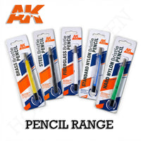 AK Interactive Bristle Pencils complete range of five types in retail packaging showing Brass AK9540 in yellow, Steel AK9541 in black, Fiberglass AK9542 in blue, Standard Nylon AK9543, and Hard Nylon AK9544 in green