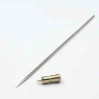 AK Interactive 0.2mm replacement parts showing full-length stainless steel needle with precision-ground taper and brass self-centering nozzle with visible orifice and stepped collar on white background