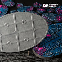 Close-up of 170mm oval Alien Infestation base showing extensive magnet mounting system and reinforced structure