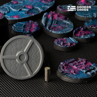 Close-up view of 40mm Alien Infestation base showing 6mm magnet slot with magnet installation on dark background