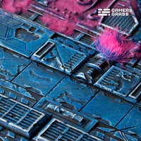 Extreme close-up of 170mm oval Alien Infestation base showing massive alien terrain and intricate horror elements