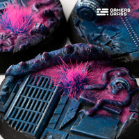 Extreme close-up detail of 40mm Alien Infestation base showing alien biomass and spacecraft wreckage textures