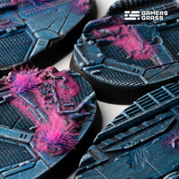 Extreme close-up detail of 60mm oval Alien Infestation base showing detailed alien biomass and wreckage