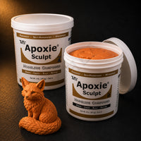 Aves Apoxie Sculpt 4lb Orange — large Part A and Part B tubs with orange putty visible, alongside a detailed sculpted sitting fox with fine fur texture