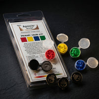Aves Apoxie Sculpt Primary Colour Kit with retail blister pack and open sample pods in red, yellow, blue and green for colour mixing and sculpting