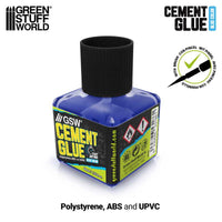 Green Stuff World Blue Cement Glue 40ml bottle with blue adhesive and brush applicator – front view.