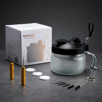 Gaahleri airbrush cleaning kit all 11 pieces displayed with cleaning pot gold needle handle brushes and filters on grey textured surface