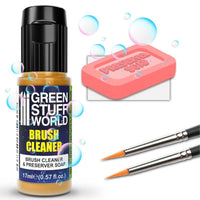 Green Stuff World brush cleaner bottle with soap bar and brushes on a white background
