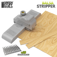 Balsa wood strip cutter tool creating thin wooden planks for model making and terrain building