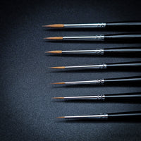 Close up of Hobby Heaven Series 3 Kolinsky Sable brush tips showing fine pointed detail