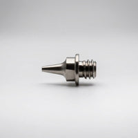 Iwata 0.3mm fluid nozzle IWS-7044 for Revolution M1 front view showing bore and hex profile - Hobby Heaven