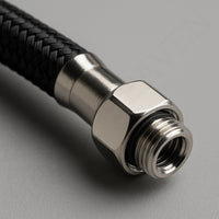 Close-up of IWATA braided airbrush hose metal connector with factory-fitted O-ring – 1/8 to 1/4 BSP