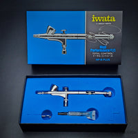 Iwata HP-B Plus airbrush set displayed with box and wrench