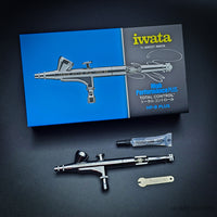 Iwata HP-B Plus airbrush set displayed with box and wrench