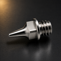 Technical studio image of Iwata Revolution M2 0.4mm fluid nozzle replacement part IWS-7045