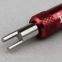 Close-up of Iwata Nozzle Wrench IWCL-NW-1 metal tip for nozzle removal