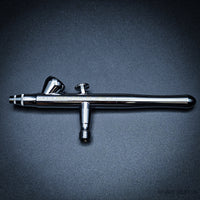 Side view of Iwata Revolution BR airbrush showing engraved model markings