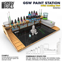 Miniature painting workstation with paint bottle storage and drawers