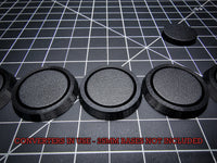 Closeup of OBS round base fitted in a converter - Detailed view showing the tight fit and design of the conversion system