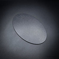 Oval 170x105 mm ABS miniature base with textured surface for secure model mounting