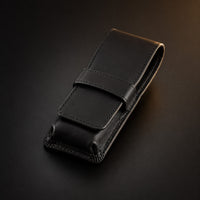Rosemary & Co black leather 3 pocket brush wallet shown closed for storing pocket travel brushes
