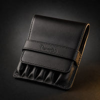Rosemary & Co black leather 6 pocket brush wallet shown closed for storing short pocket travel brushes