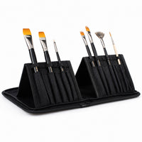 Closed Rosemary & Co black nylon brush case with white logo, slim zip-around design and textured outer cover