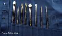 Open Rosemary & Co large navy fabric brush wrap showing long-handle artist brushes stored in individual canvas pouches