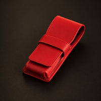 Rosemary & Co red leather 3 pocket brush wallet shown closed for storing short pocket travel brushes