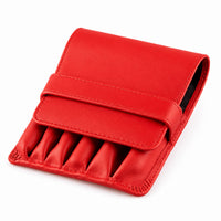 Closed Rosemary & Co red leather 6 pocket travel brush wallet with fold-over flap and tuck strap