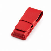Closed Rosemary & Co red leather travel brush wallet with fold-over flap and tuck strap