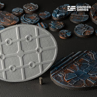 Close-up of 120mm oval Spaceship Corridor base showing comprehensive magnet mounting system and reinforced structure