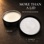 Graphic: open tin of solid soap and the lid's textured silicone pad with waves, spiral and dots