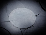 Matte black 120x92mm oval plain plastic wargaming base with a fine textured top, injection-moulded ABS.