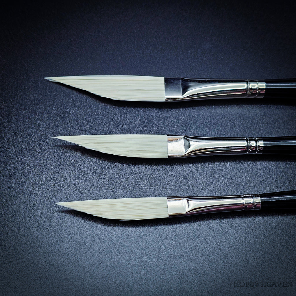 Rosemary & Co Ivory sword liner brush heads close up, showing the angled edge tapering to a needle-fine point