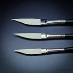 Rosemary & Co Ivory sword liner brush heads close up, showing the angled edge tapering to a needle-fine point