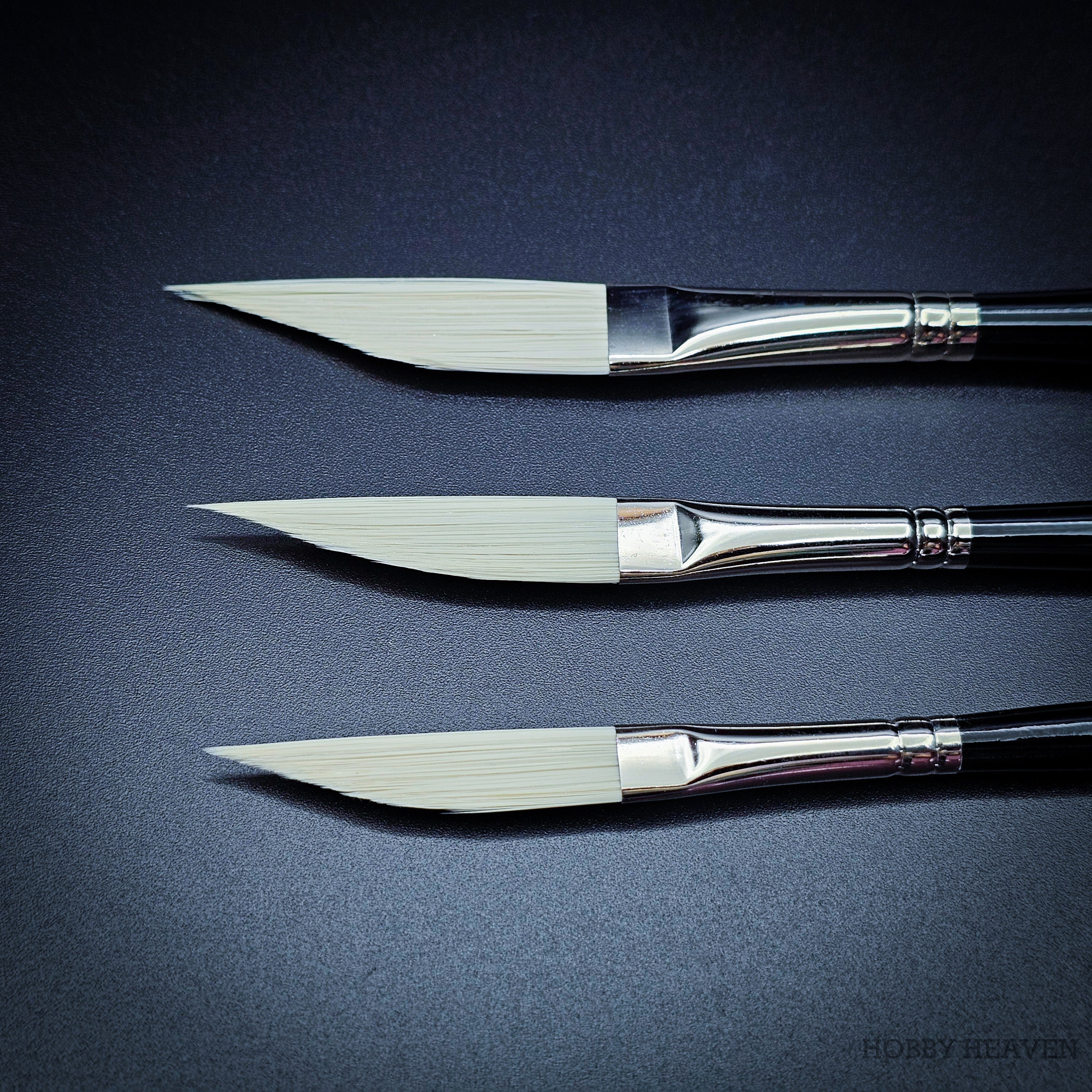 Rosemary & Co Ivory sword liner brush heads close up, showing the angled edge tapering to a needle-fine point