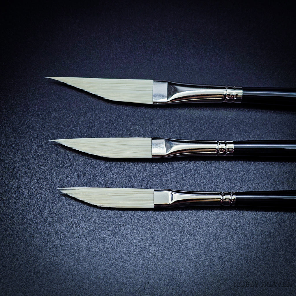 Rosemary & Co Ivory sword liner brush heads in detail — the full belly tapering to a sharp point along one working edge