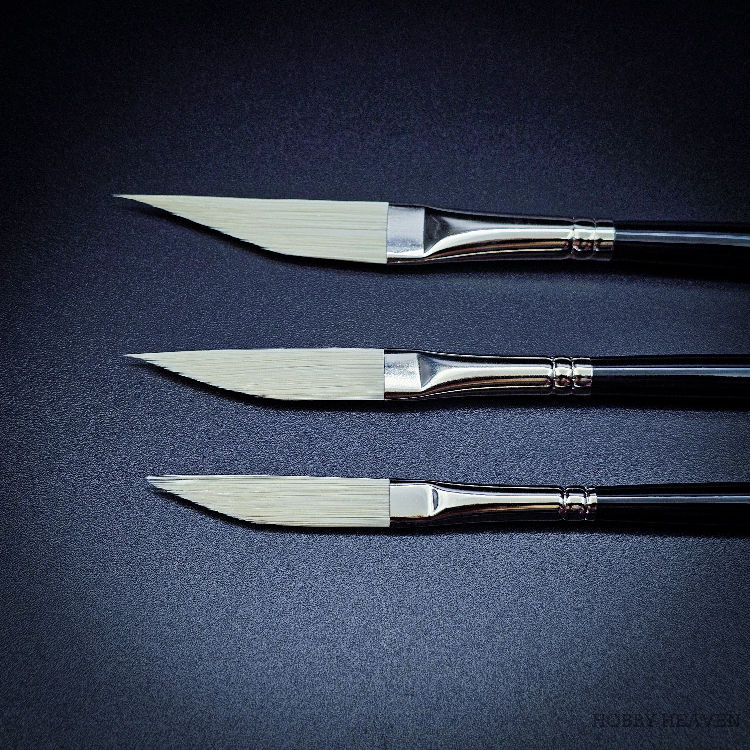 Rosemary & Co Ivory sword liner brush heads in detail — the full belly tapering to a sharp point along one working edge
