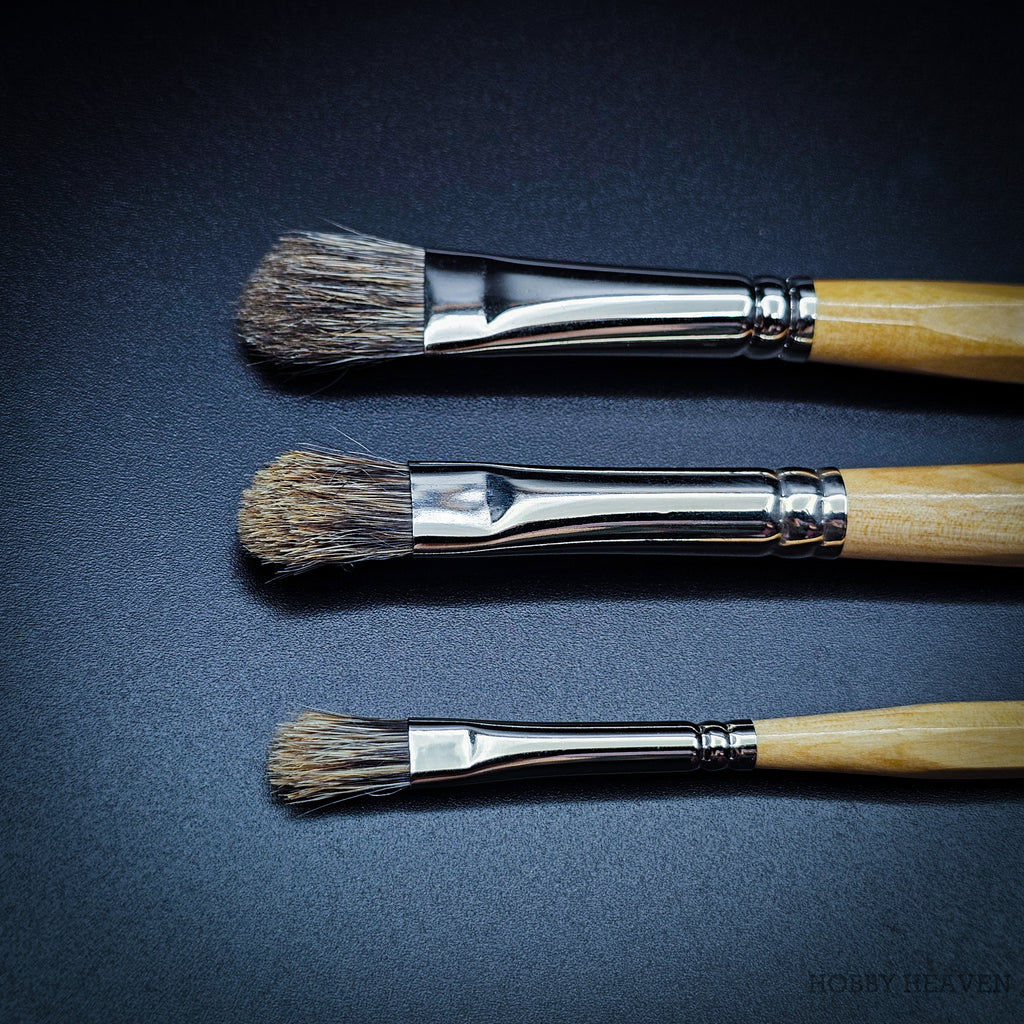 Rosemary & Co Series 32 badger stippler brush heads close up, showing the coarse mottled badger hair in a short rounded head