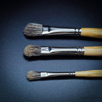Rosemary & Co Series 32 badger stippler brush heads close up, showing the coarse mottled badger hair in a short rounded head