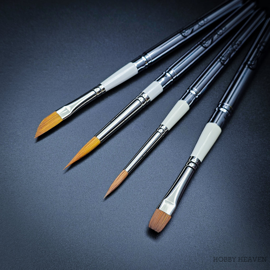 Set 35 Travel Brush Essentials — four pocket brushes open showing R12 dagger, R1 Kolinsky pointed round, R13 sable blend designer and R20 Red Dot flat