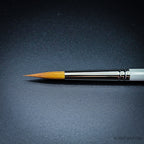 Close-up of R13 sable blend designer pointed brush head showing the tapered golden-toned fibre