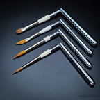 Four Set 35 pocket brushes arranged with handles open at right angles showing all four head shapes and Rosemary & Co branding