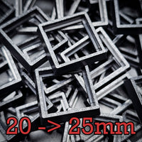 Black square base converters 20mm to 25mm scattered on dark background
