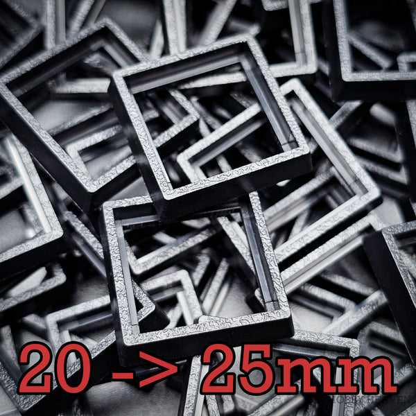 Black square base converters 20mm to 25mm scattered on dark background
