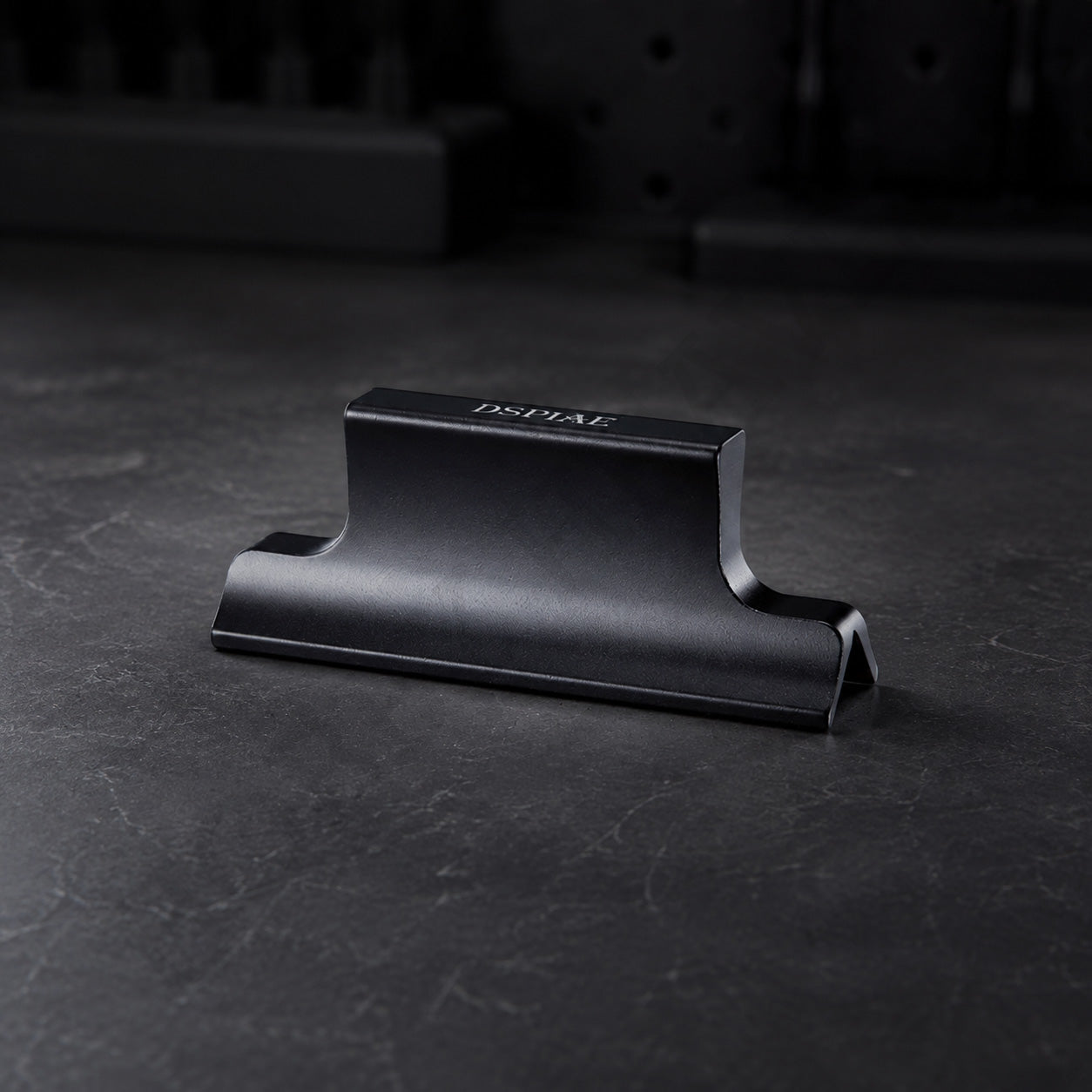 DSPIAE AS-25PPBK right angle sanding block in black anodised aluminium on a dark stone surface
