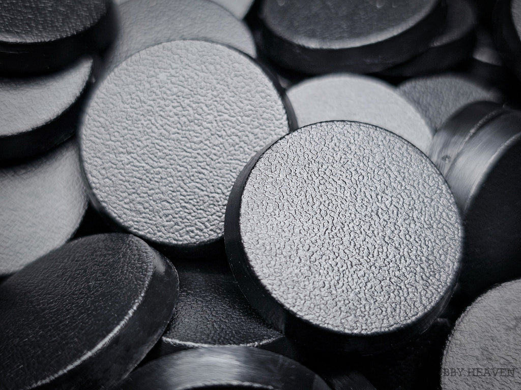 Close-up of 25mm round bases for Warhammer 40k, Age of Sigmar, and other tabletop games